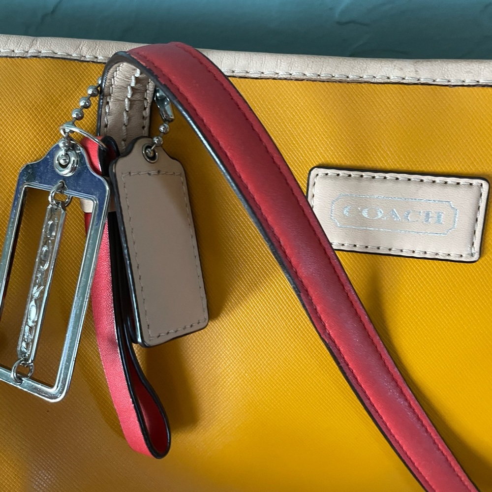 Coach purse in  deep golden yellow with tan shoulder straps